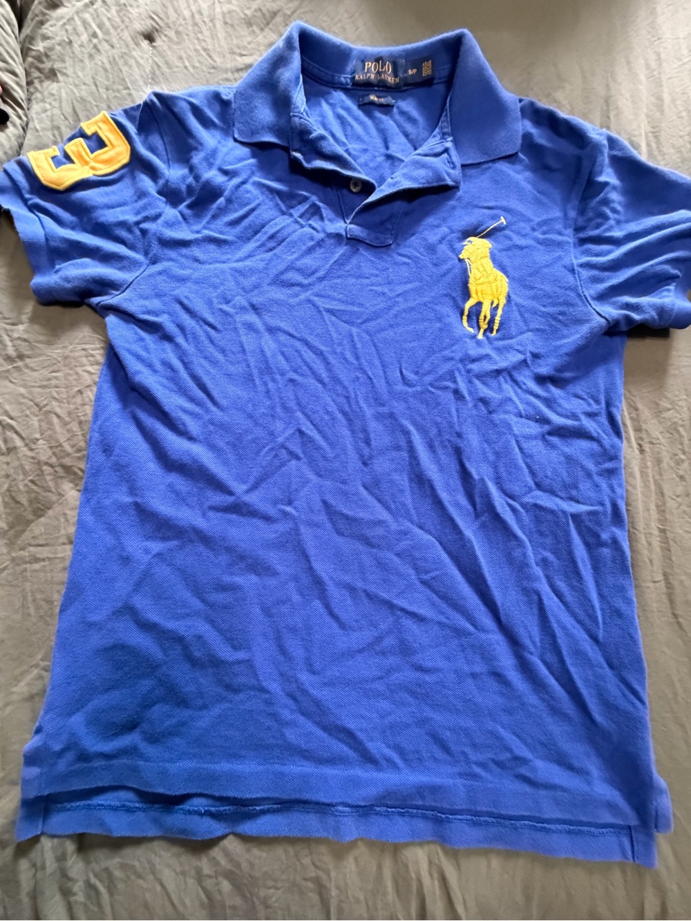 Polo by Ralph Lauren Men’s Blue Polo Shirt with Yellow Logo